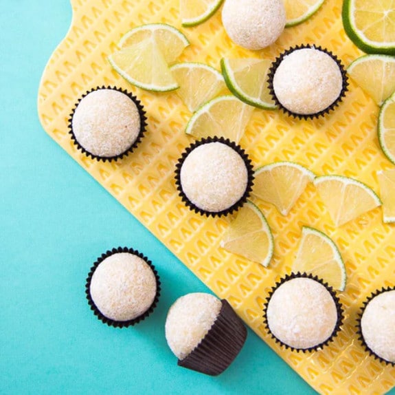 spread of citrus truffles with lime wedges