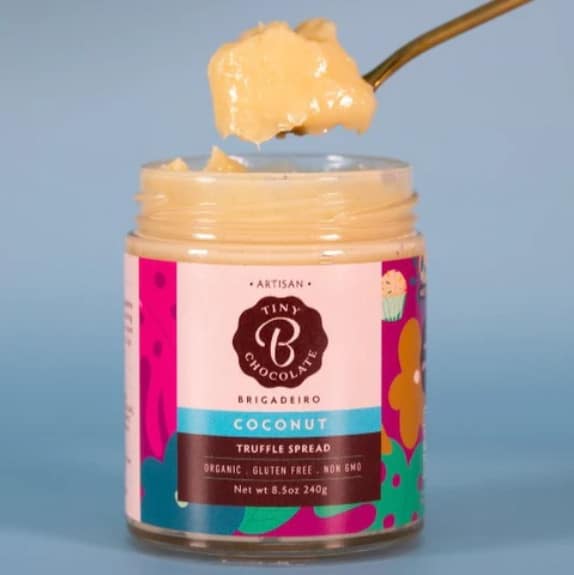 jar of coconut truffle spread with spoon